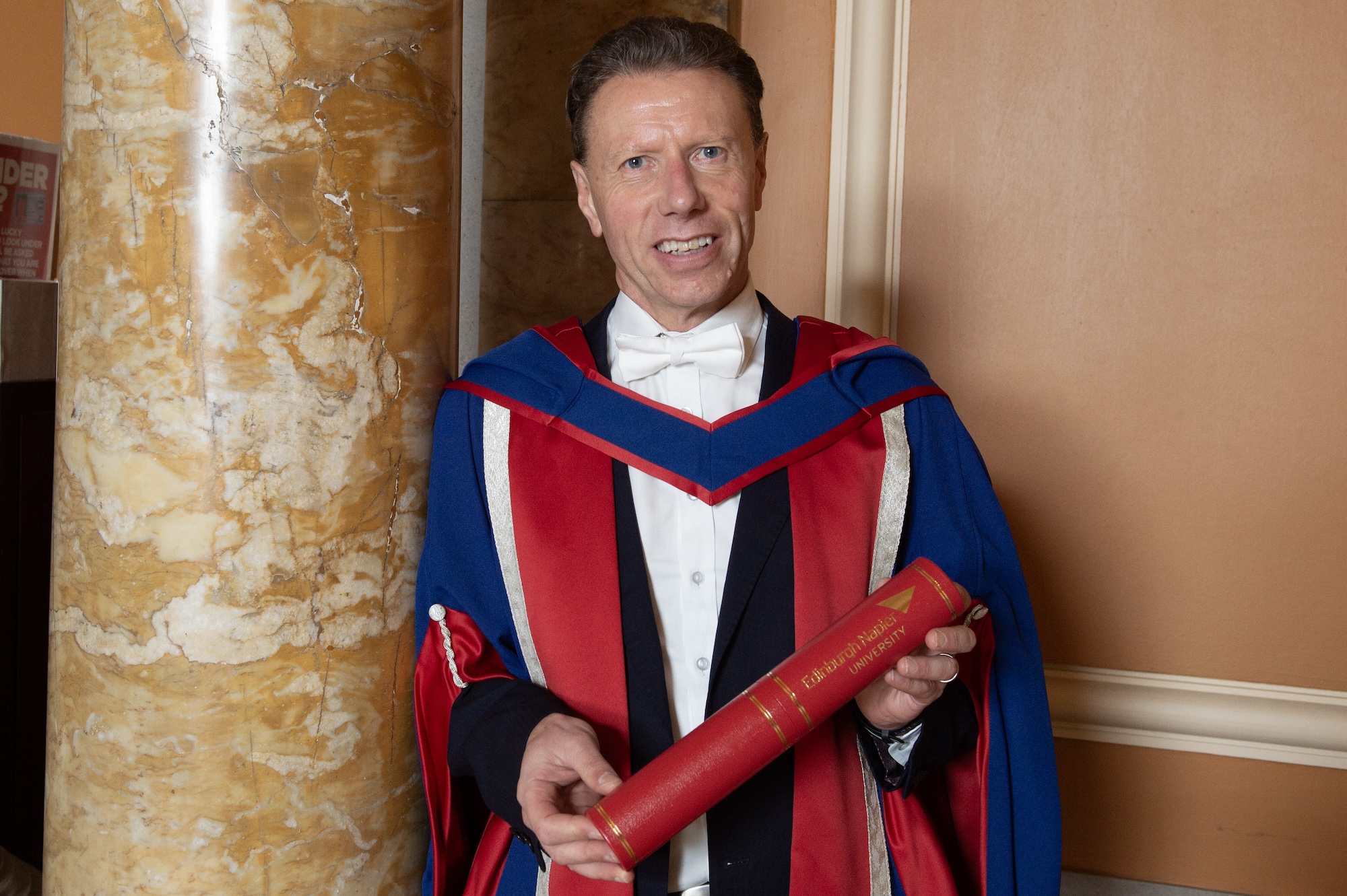 ENU presents FinTech Scotland founder with honorary doctorate